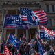 Trump supporters protest the 2020 election results on Nov. 7, 2020, outside the Michigan State Capitol in Lansing.